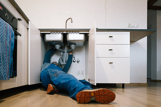 Professional Emergency Plumber technician working in Memphis, MI